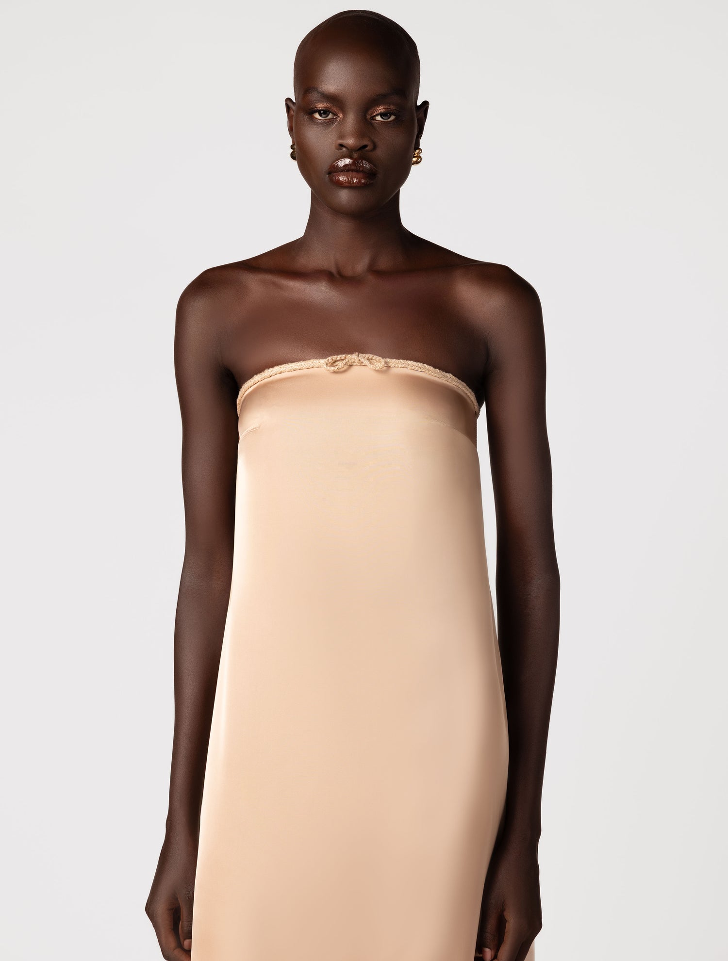 Strapless silk maxi dress with bow in gold